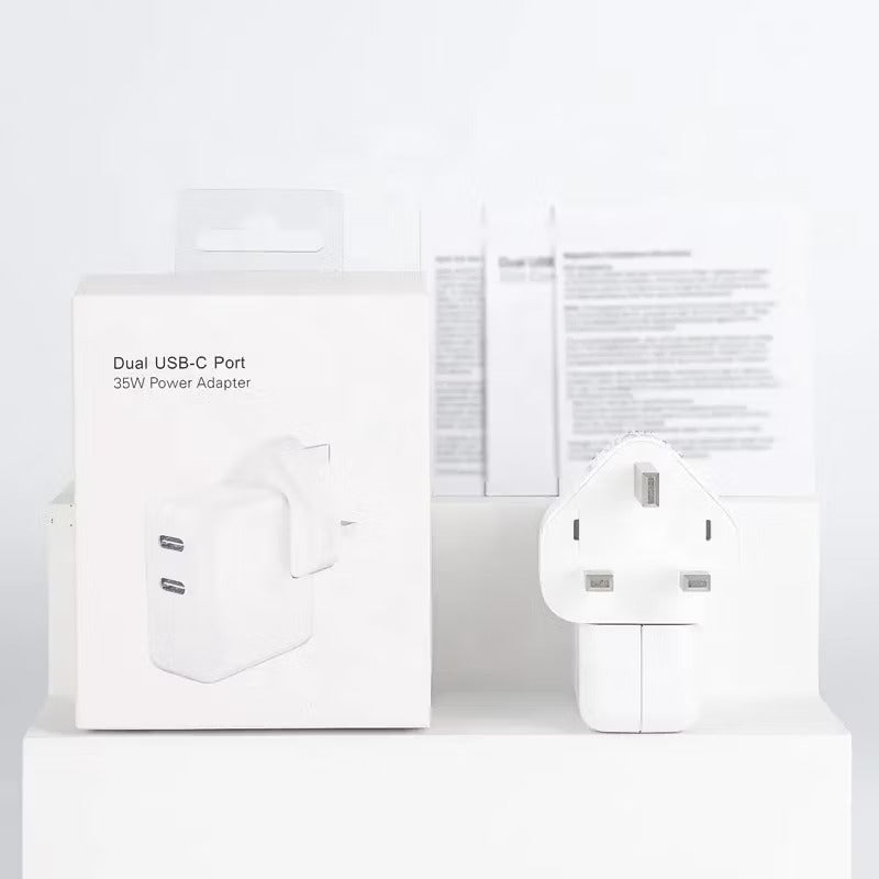 Prime Tech Store iPhone 35W UK 3-pin dual Type C fast charging Power Delivery adapter on a white background.
