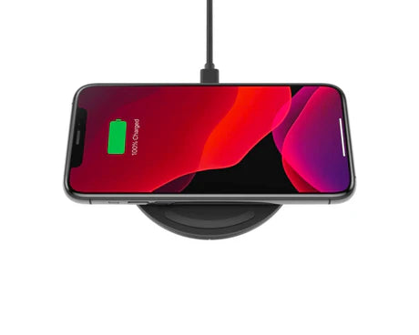 Prime Tech Store Belkin wireless charging pad with 10W power, showing a sleek black surface for Qi-compatible device charging.