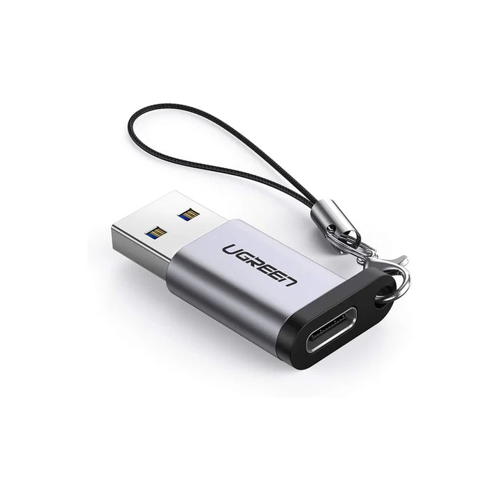 UGREEN USB 3.0 male to Type C female adapter connected to a device, showing compact design and blue USB port.