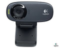 Prime Tech Store Logitech C310 HD webcam showing a sleek black design with a built-in microphone and adjustable clip.
