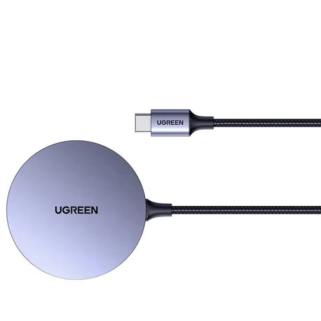 UGREEN CD245 magnetic wireless charger 15W with sleek design and magnetic hold, charging a smartphone wirelessly on a desk.